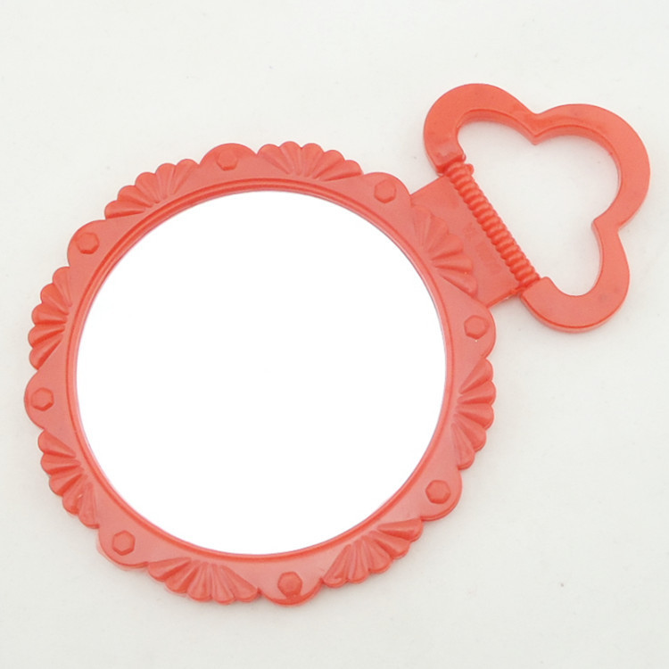 Plastic folding mirror