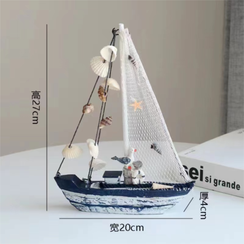 Blue and white shell sailboat style ornament