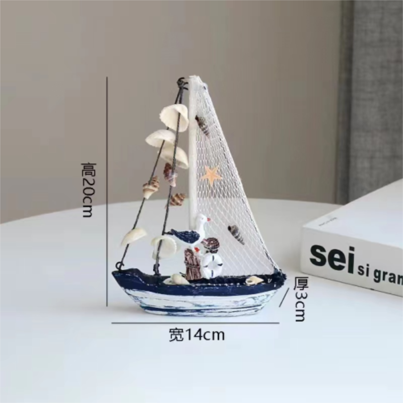 Blue and white shell sailboat style ornament