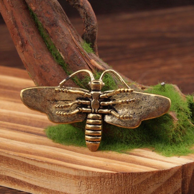 Brass material moth shaped ornament